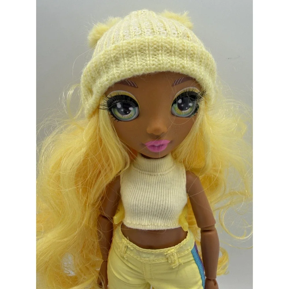 Rainbow High Winter Break Sunny Madison Yellow Fashion Doll Complete with Skis